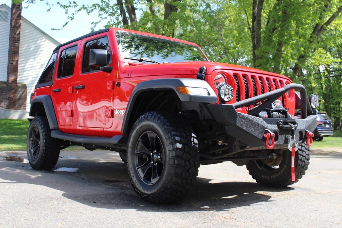 Red Jeep detailed outdoors