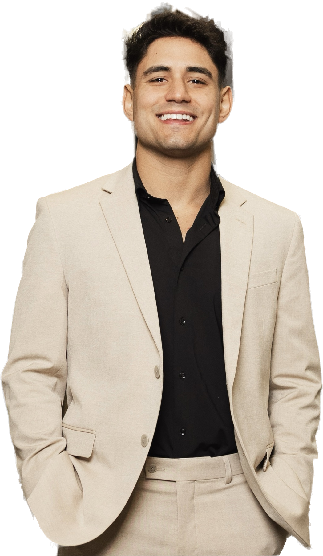 Matthew Tenney smiling in a cream suit